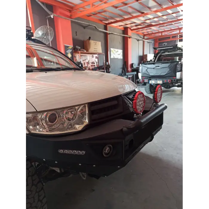 MITSUBISHI L200 2011-2014 ÖN DEMİR TAMPON THRU