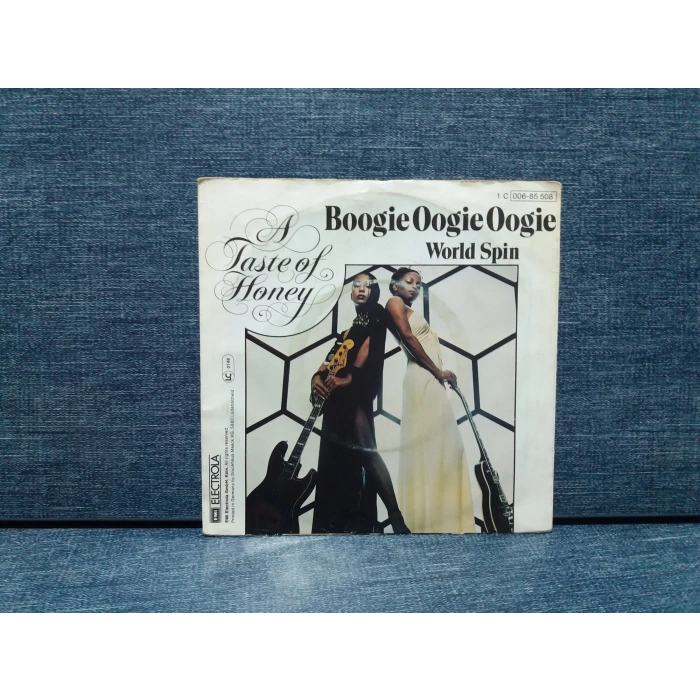 A TASTE OF HONEY BOOGIE - WORLD SPIN