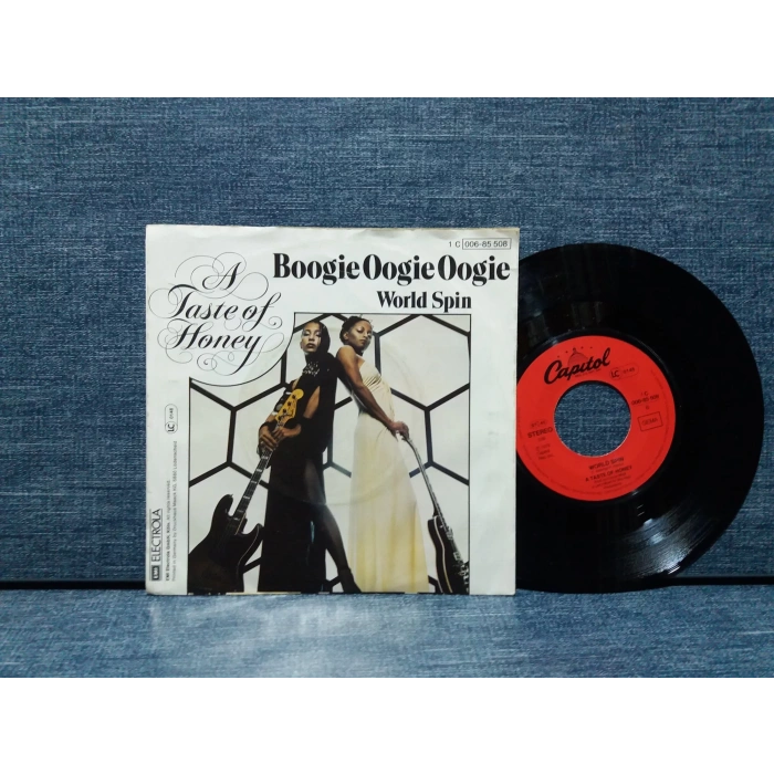 A TASTE OF HONEY BOOGIE - WORLD SPIN