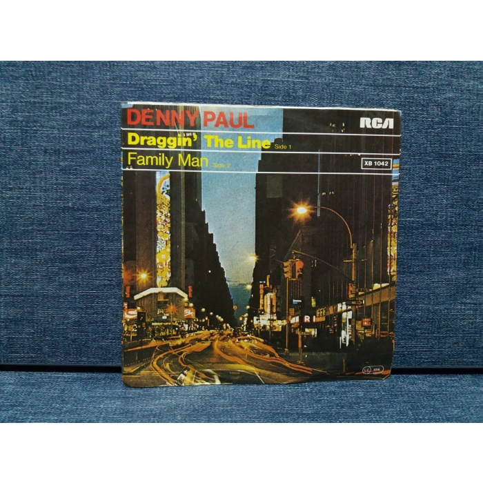 DENNY PAUL DRAGGIN THE LINE