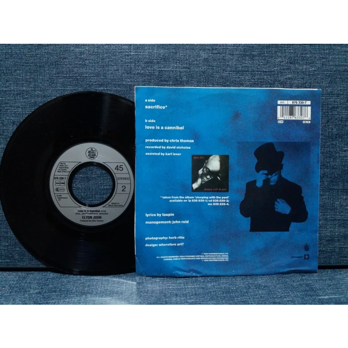 ELTON JOHN SACRIFICE  -  LOVE IS A CANNIBAL