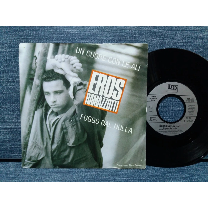EROS RAMAZZOTTI UN CUORE CON LE ALI