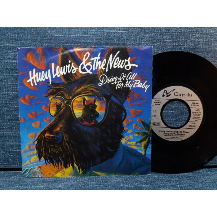 HUEY LEWIS DOING IT ALL FOR