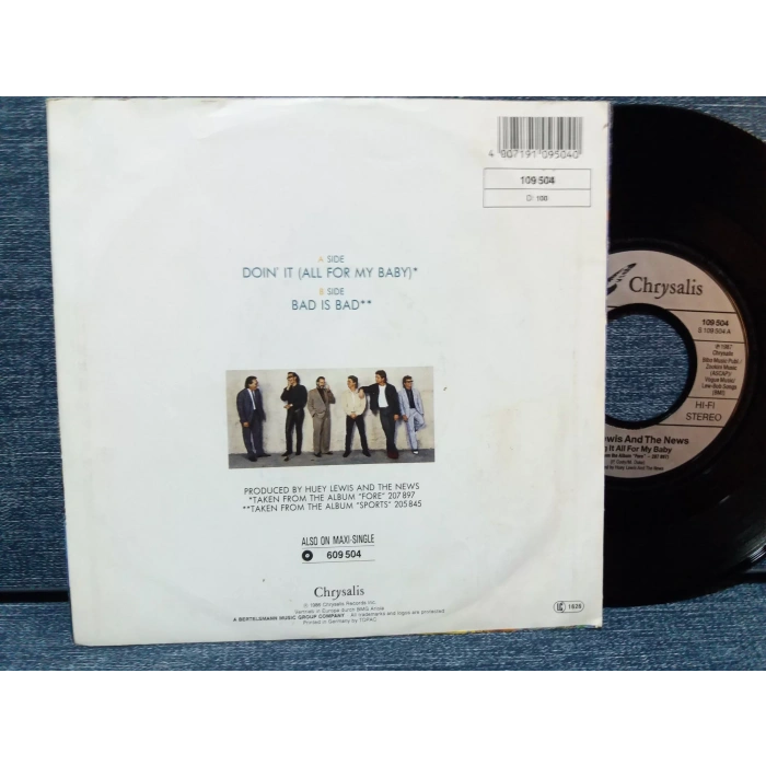 HUEY LEWIS DOING IT ALL FOR