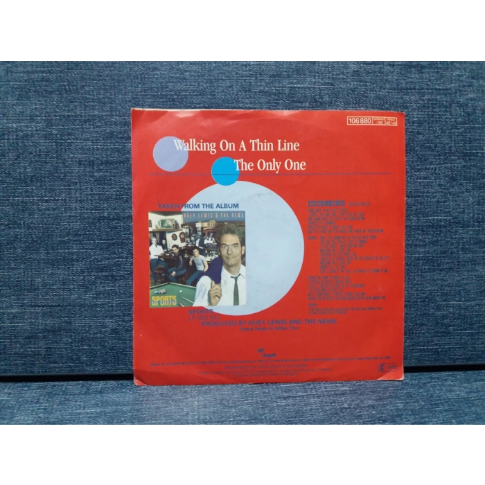 HUEY LEWIS WALKING ON A THIN LINE
