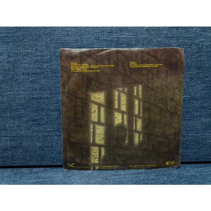 MIKE OLDFIELD SHADOW ON THE WALL