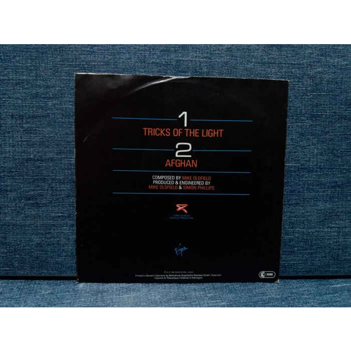 MIKE OLDFIELD TRICKS OF THE LIGHT