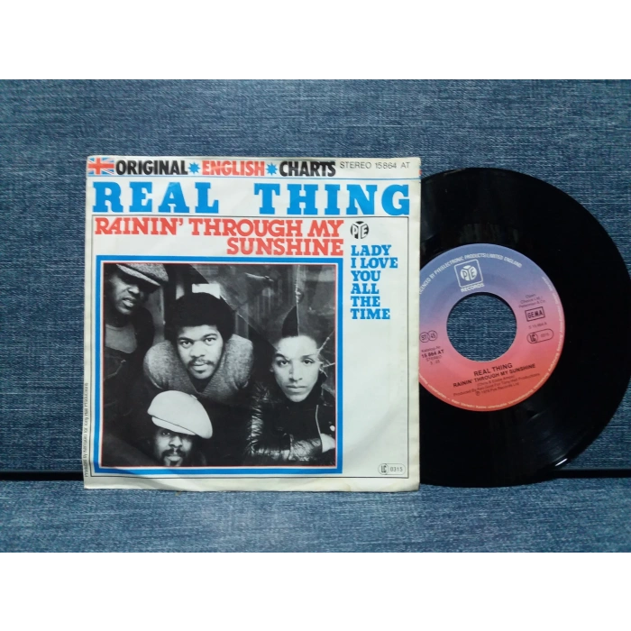 REAL THING RAININ THROUGH MY SUNSHINE