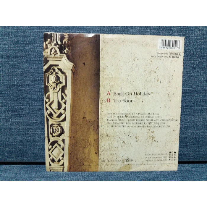 ROBBIE NEVIL BACK ON HOLIDAY