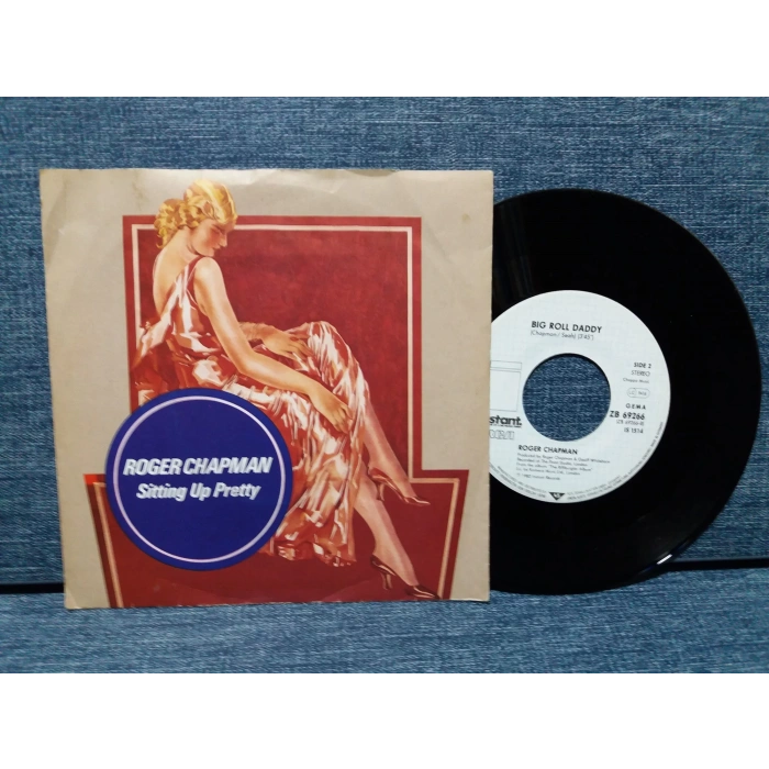 ROGER CHAPMAN SITTING UP