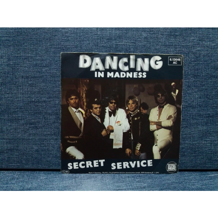 SECRET SERVICE DANCING IN MADNESS