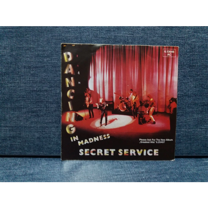 SECRET SERVICE DANCING IN MADNESS