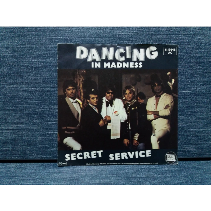 SECRET SERVICE DANCING IN MADNESS