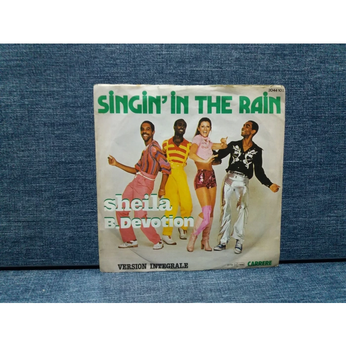 SHEILA B.DEVOTION SINGININ THE RAIN