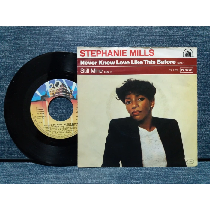 STEPHANIE MILLS NEVER KNEW LOVE LIKE