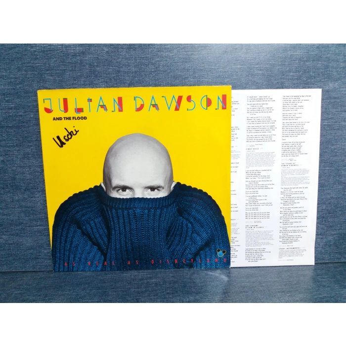 JULIAN DAWSON AND THE FLOOD AS REAL AS DISNEYLAND