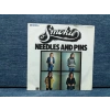 SMOKIE NEEDLES AND PINS