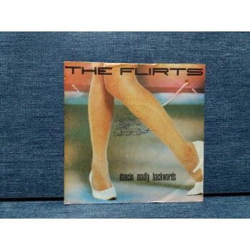 FLIRTS DANCIN MADLY BACKWARDS