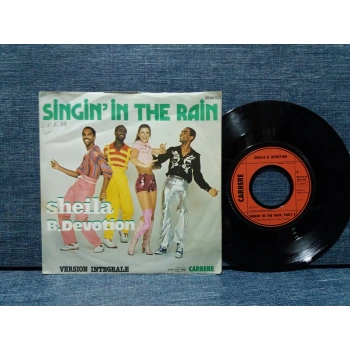 SHEILA B.DEVOTION SINGININ THE RAIN