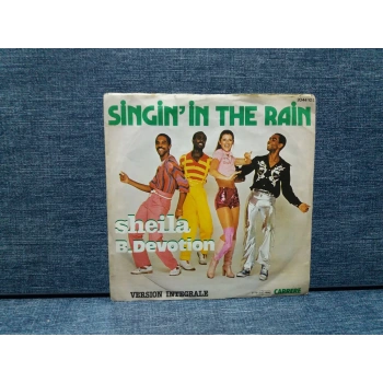 SHEILA B.DEVOTION SINGININ THE RAIN