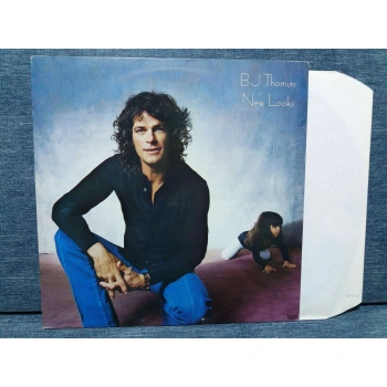 B.J. THOMAS NEW LOOKS