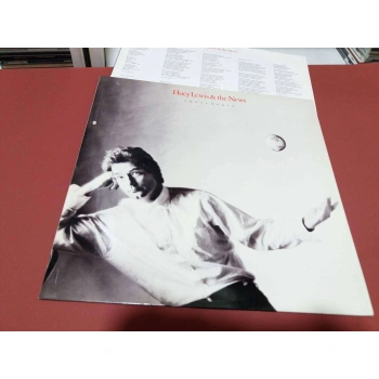 HUEY LEWIS SMALL WORLD