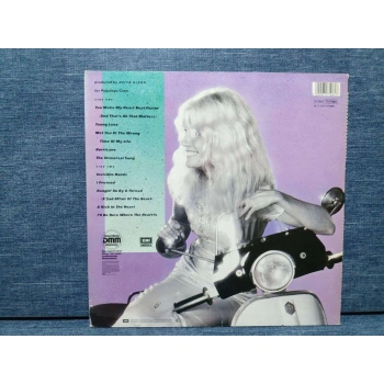 KIM CARNES CAFE RACERS