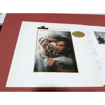 LOVERS AND OTHER STRANGERS