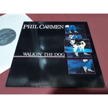 PHIL CARMEN WALKIN THE DOG