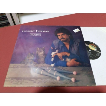 ROBERT FORMAN CAT JUGGLING