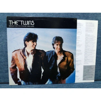 THE TWINS HOLD ON TO YOUR DREAMS