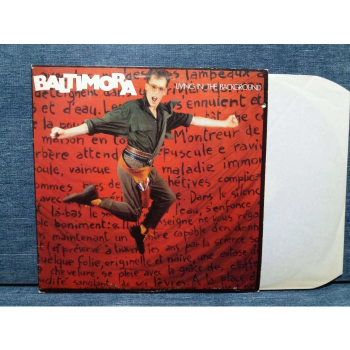 BALTIMORA LIVING IN THE BACKGROUND