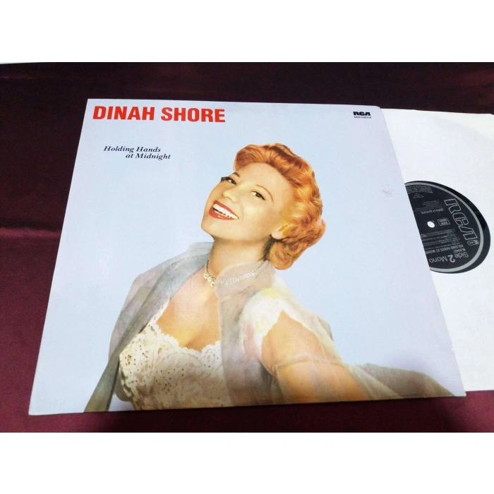 DINAH SHORE HOLDING HANDS AT MIDNIGHT