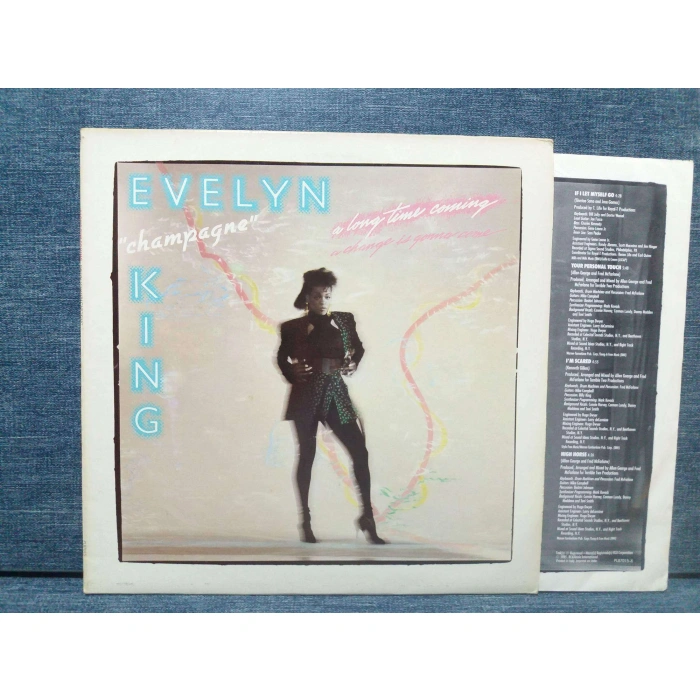 EVELYN KING CHAMPAGNE