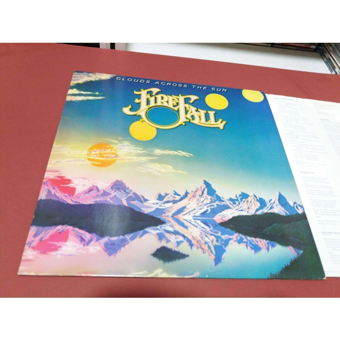 FIREFALL CLOUDS ACROSS THE SUN