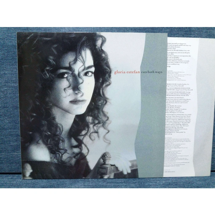 GLORIA ESTEFAN CUTS BOTH WAYS