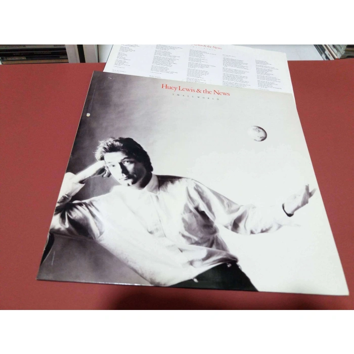 HUEY LEWIS SMALL WORLD