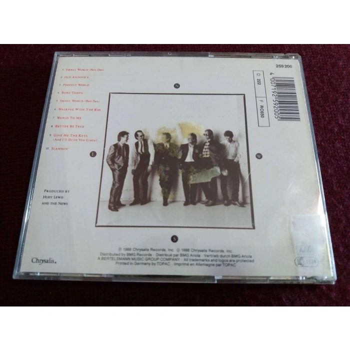 HUEY LEWIS THE NEWS SMALLWORLD