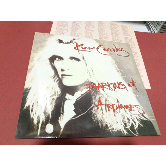 KIM CARNES BARKING AT AIRPLANES