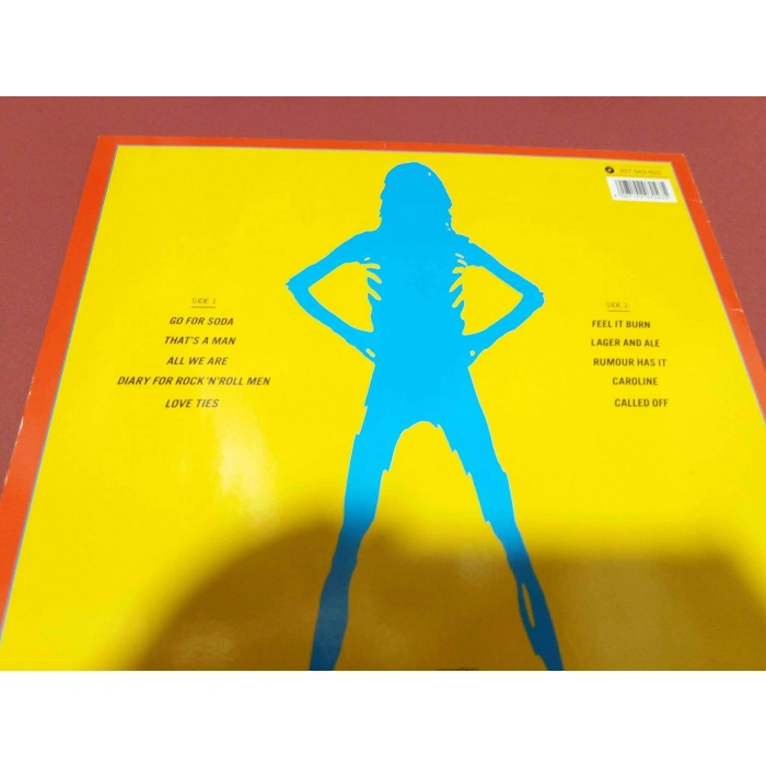 KIM MITCHELL AKIMBO ALOGO