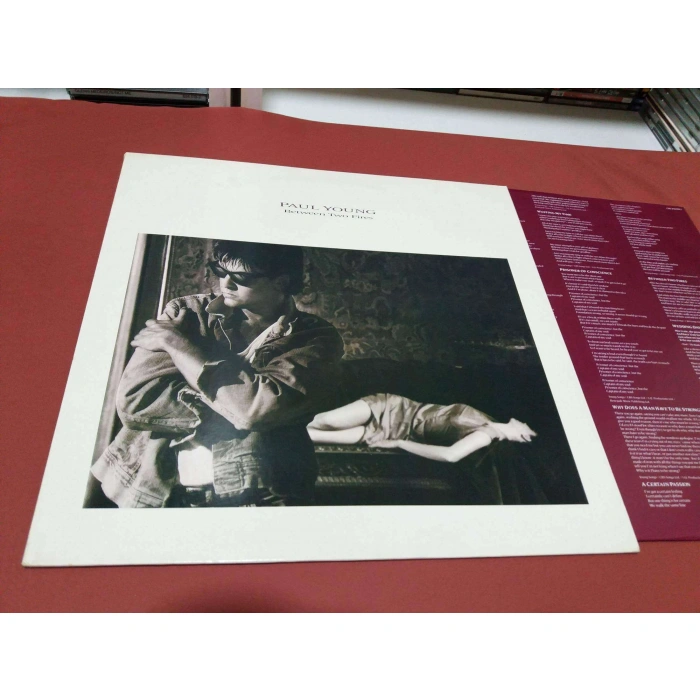 PAUL YOUNG BETWEEN TWO FIRES ALBUM