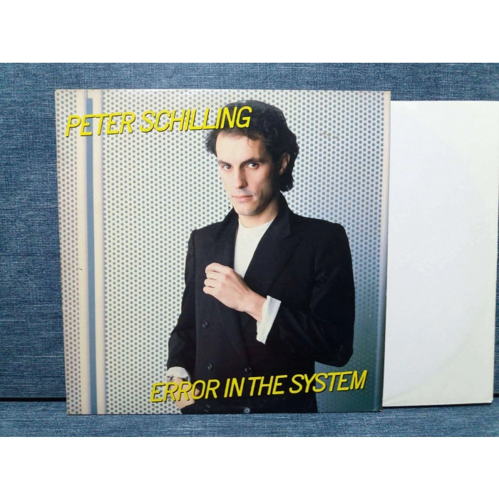 PETER SCHILLING ERROR IN THE SYSTEM