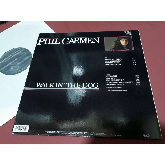 PHIL CARMEN WALKIN THE DOG