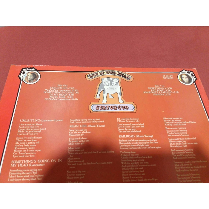 STATUS QUO DOG OF TWO HEAD