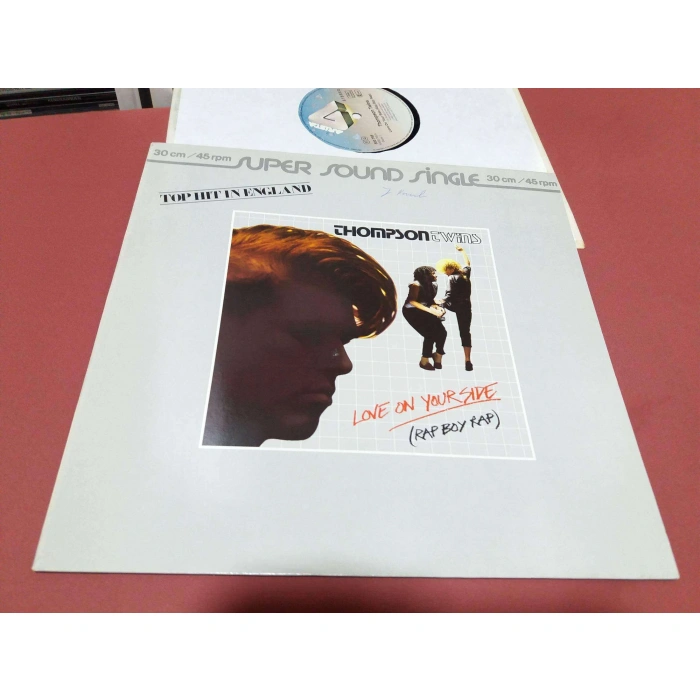 THOMPSON TWINS LOVE ON YOUR SIDE MAXI LP
