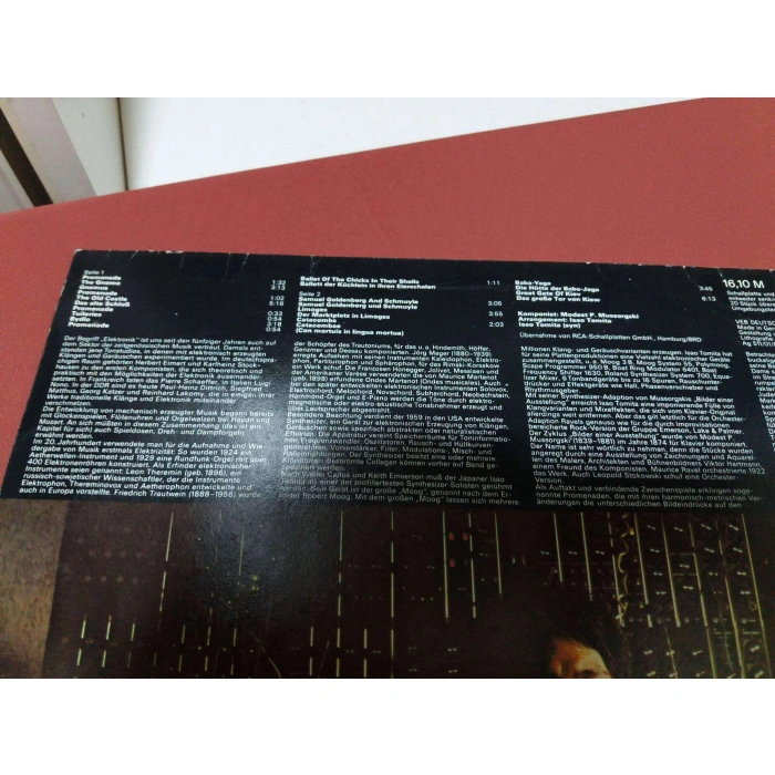 TOMITA PICTURES AT AN EXHIBITION