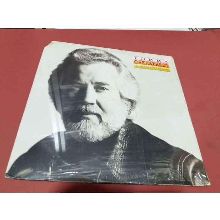 TOMMY OVERSTREET NEVER LET YOU DOWN   (SIFIR)