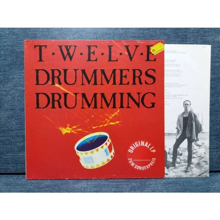 TWELVE DRUMMERS DRUMMING