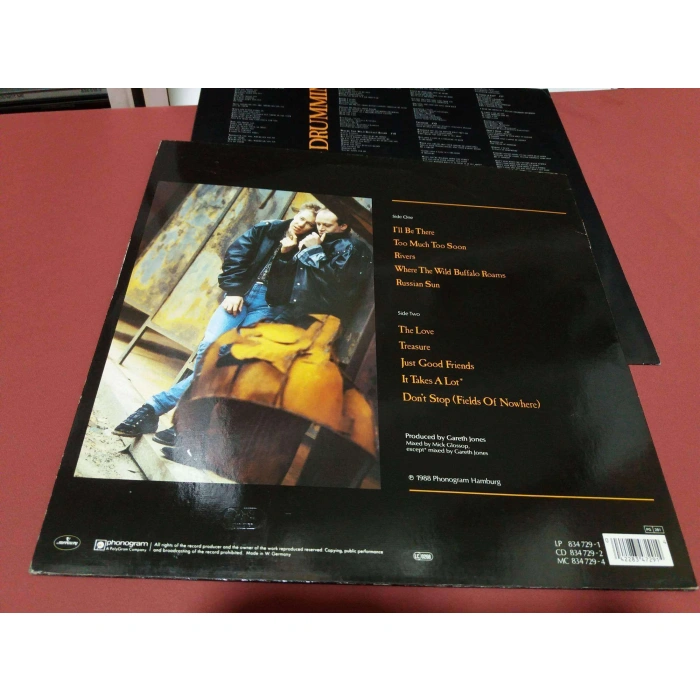 TWELVE DRUMMERS DRUMMING BUFFALO ROAMS