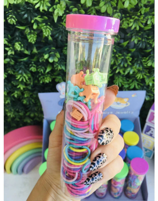 Bir Kutuda Hem Lastik Hem Mandal Toka